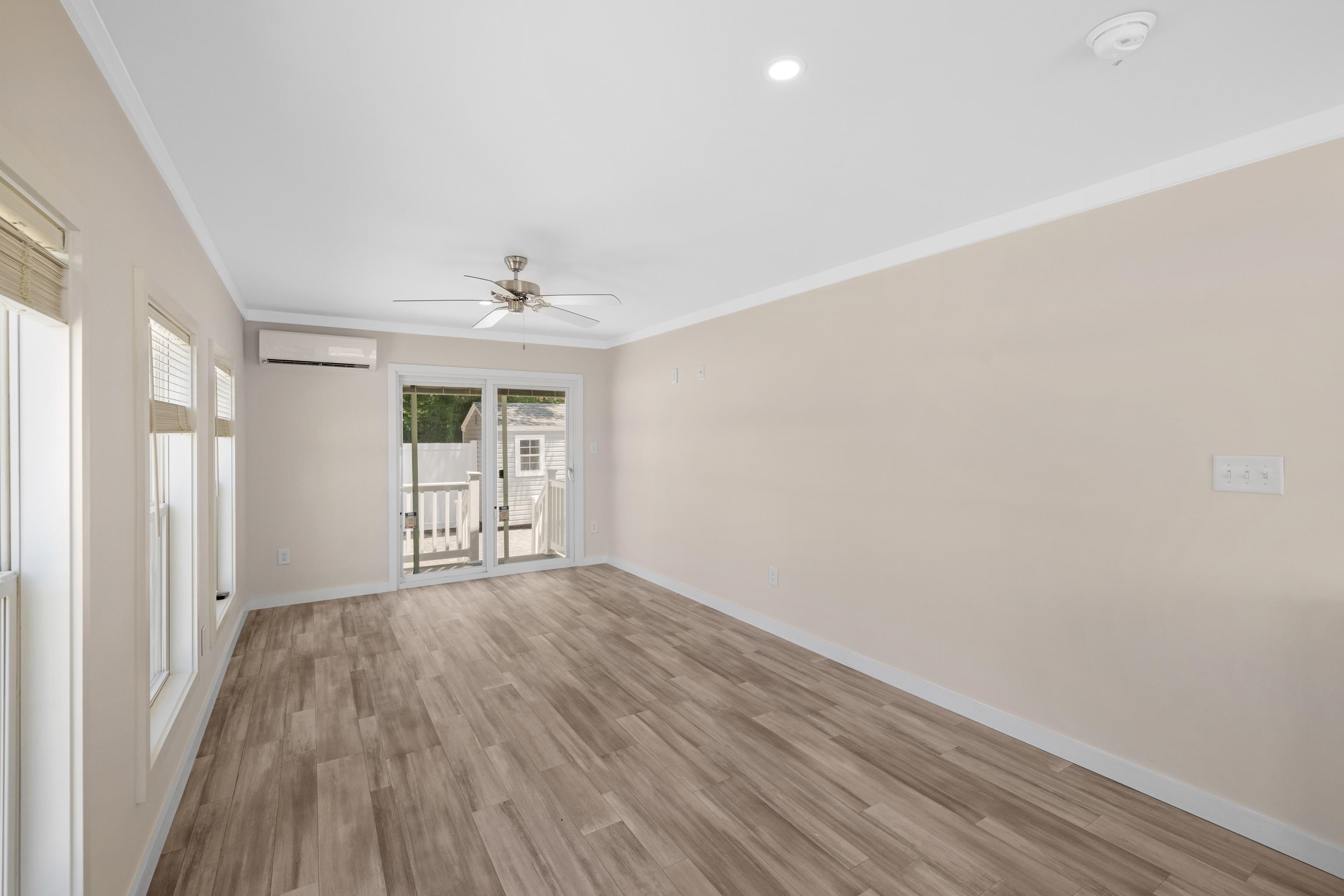 4100 Rte 9 South, Unit 39 Rio Grande, NJ 08242 - Photo 3 of 22 a view of an empty room with wooden floor and a window