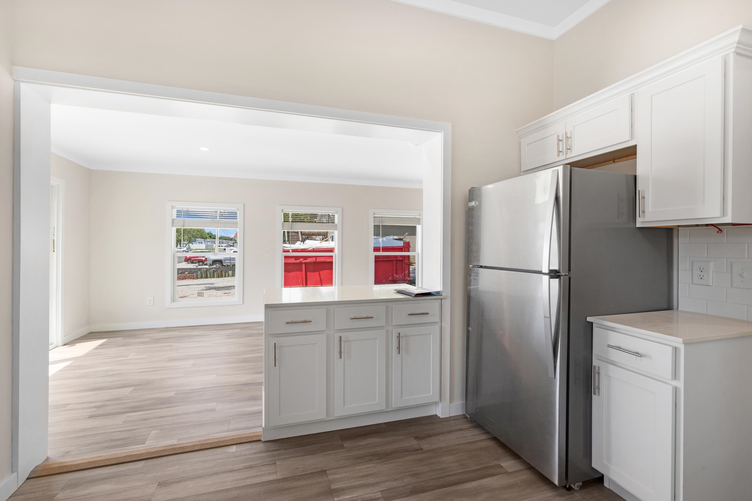 4100 Rte 9 South, Unit 39 Rio Grande, NJ 08242 - Photo 8 of 22 a kitchen with stainless steel appliances granite countertop a refrigerator and a sink