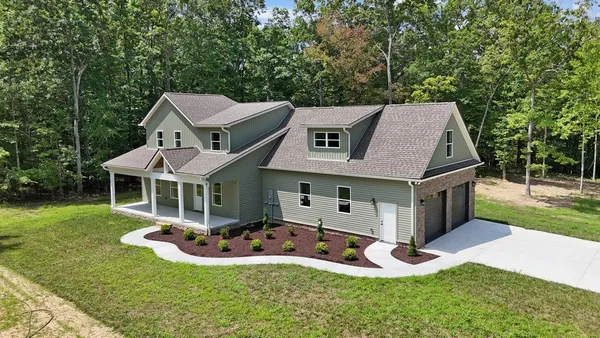 front view of a house with a yard