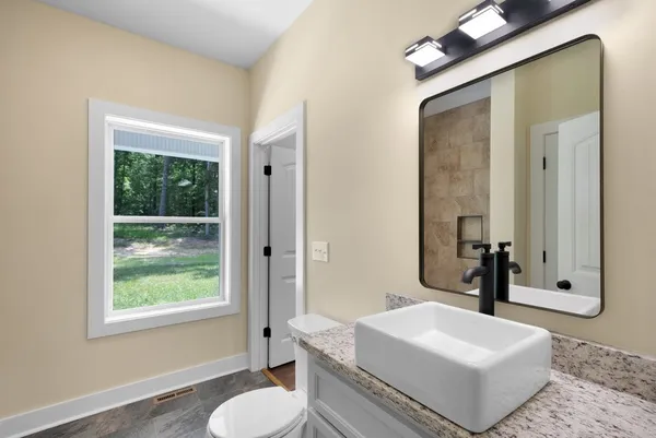 a view of an empty room and window