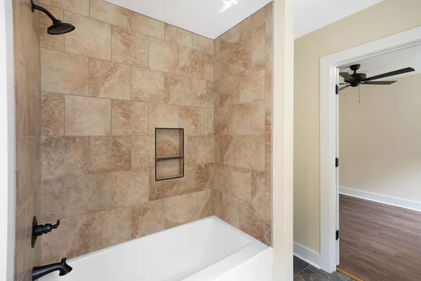 a bathroom with a sink a mirror and a toilet