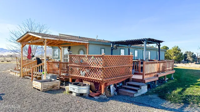 a kitchen with a sink appliances and cabinets
