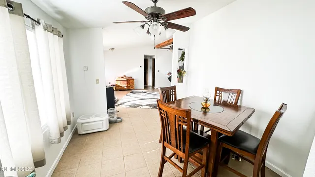 a bedroom with a bed and a bookshelf