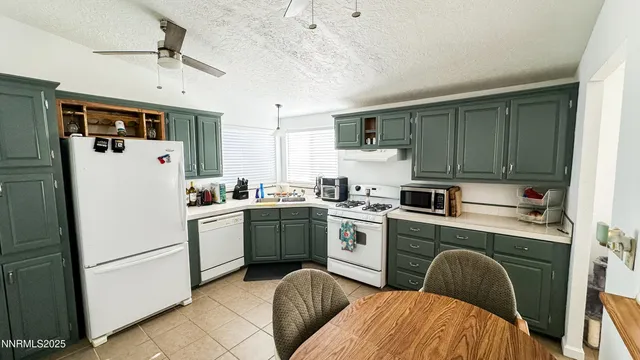 a bathroom with a sink a mirror and toilet