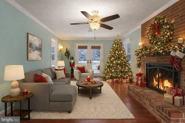 a view of a dining room with furniture large window wooden floor and a chandelier