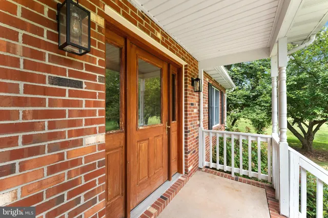 a view of livingroom with furniture wooden floor and window