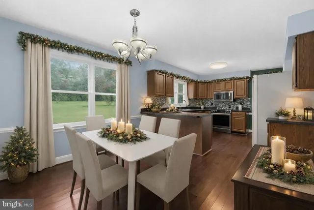 a view of a hallway with seating area