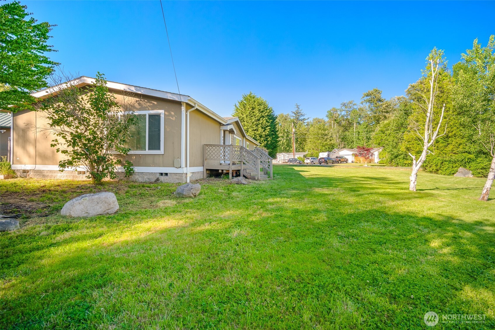 4230 Cody Road Blaine, WA 98230 - Photo 36 of 38 a view of a house with a yard