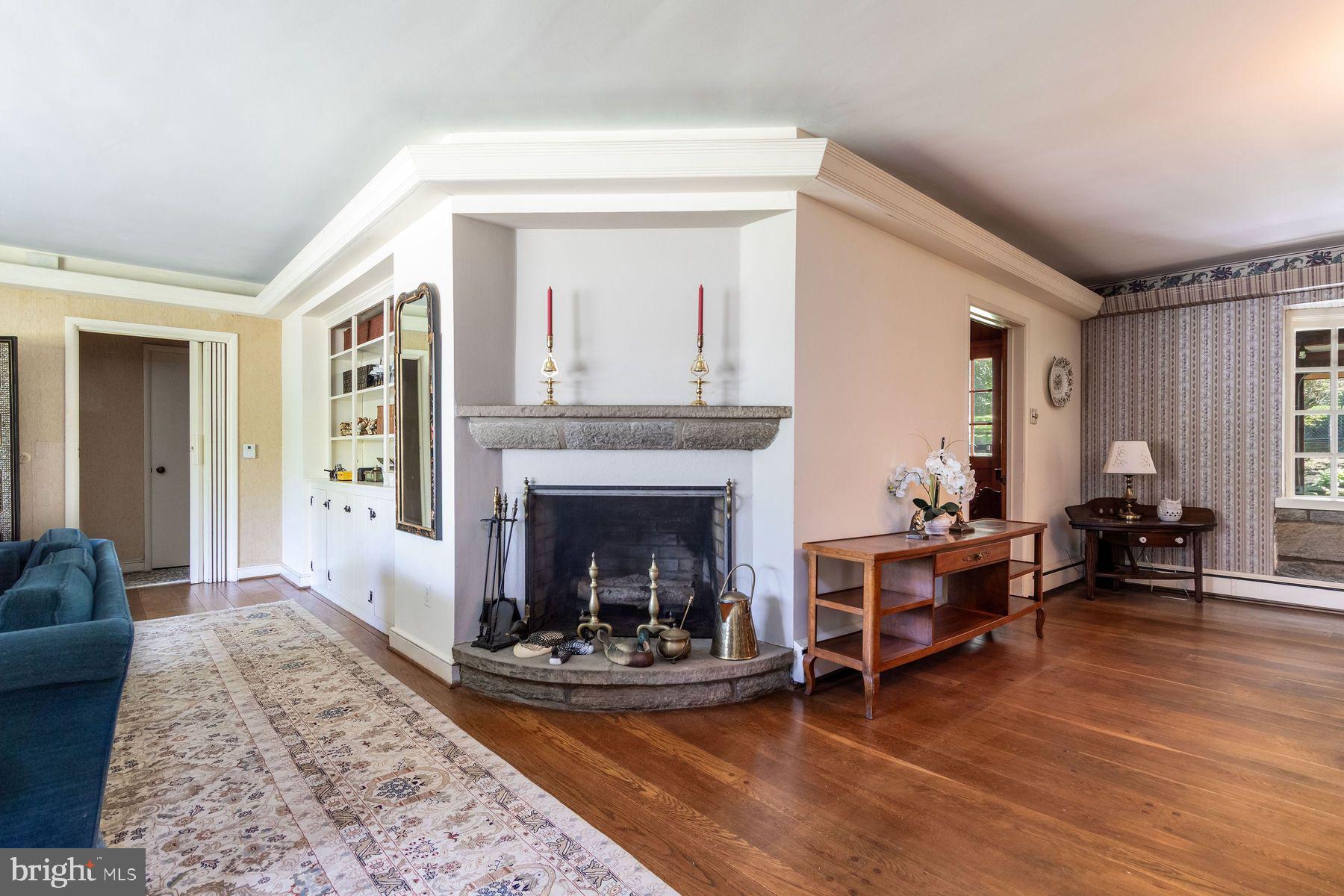2349 Valley Road Jamison, PA 18929 - Photo 21 of 53 a living room with furniture and a fireplace