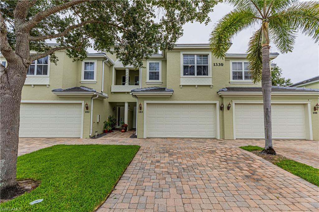 1330 Mariposa Circle, Unit 103 Naples, FL 34105 - Photo 1 of 26