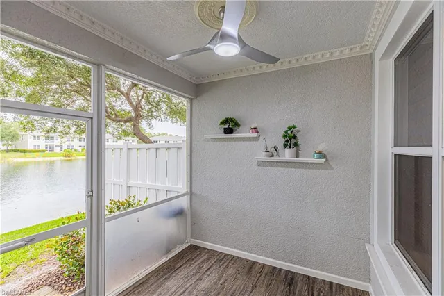 a view of kitchen with furniture and a window