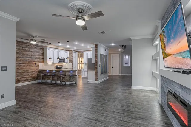 a view of dining room with furniture and wooden floor