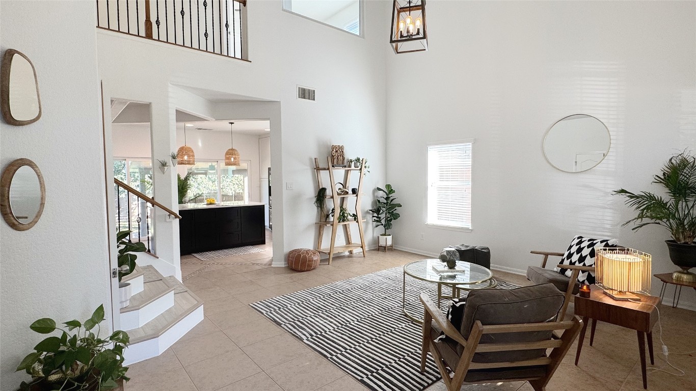 7711 Stephany Taylor Drive Austin, TX 78745 - Photo 4 of 23 a living room with furniture and wooden floor