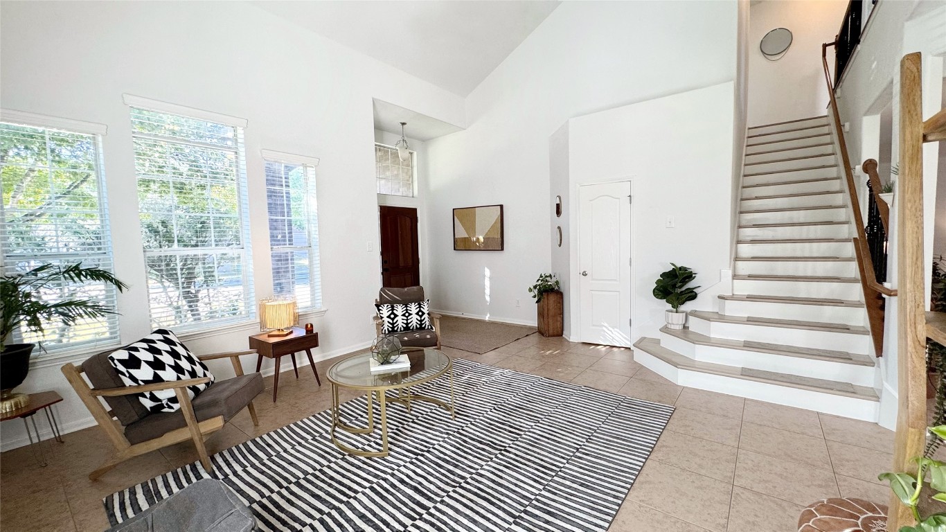 7711 Stephany Taylor Drive Austin, TX 78745 - Photo 10 of 23 a living room with furniture and wooden floor