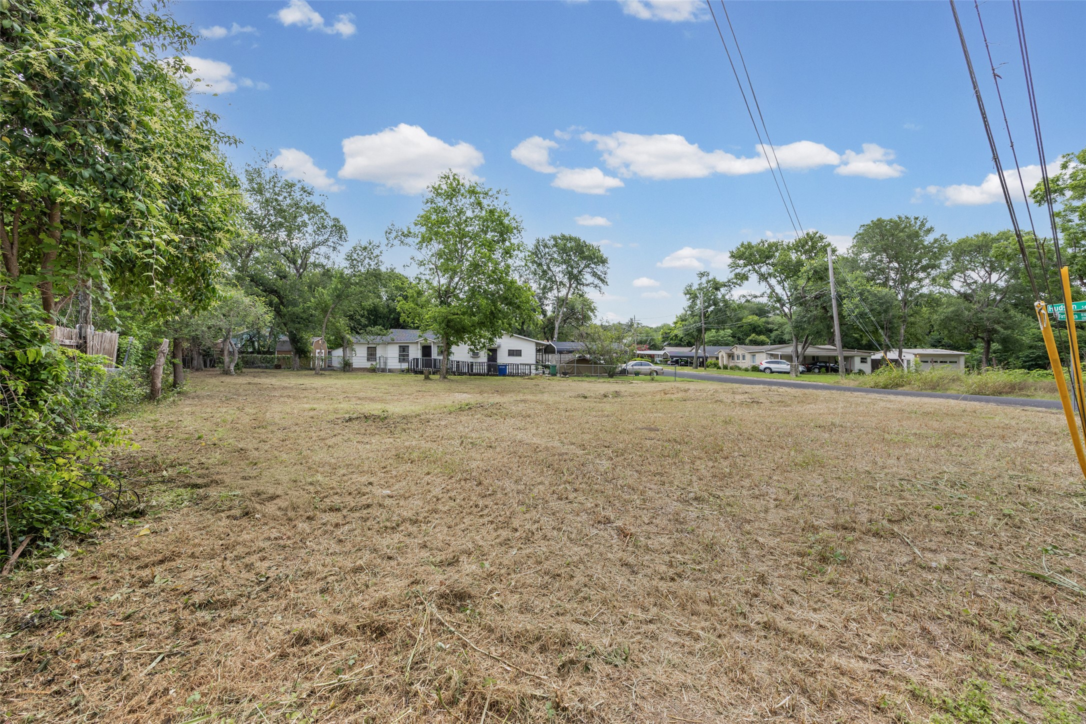 1201 Fort Branch Boulevard Austin, TX 78721 - Photo 17 of 19 A spacious, open parcel awaits your vision amidst a backdrop of mature trees and residential charm.