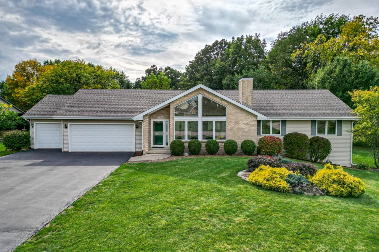 625 Waco Way Poplar Grove, IL 61065 - Photo 1 of 34 a aerial view of a house next to a yard