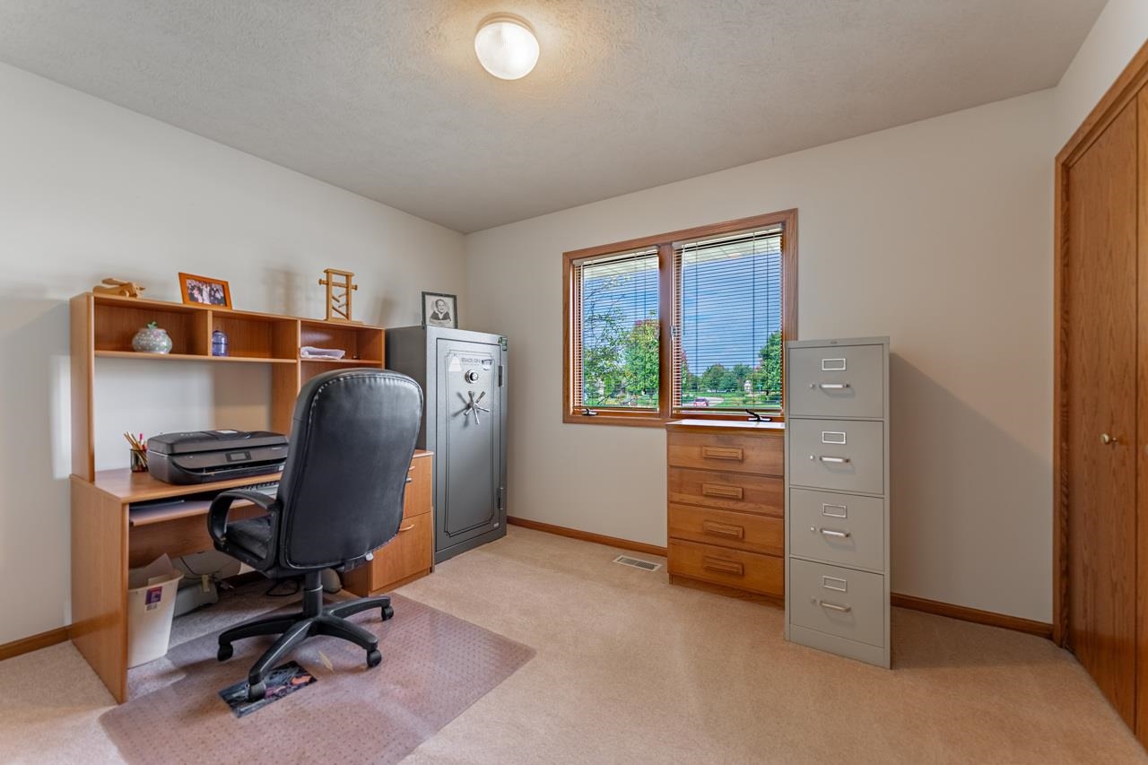 625 Waco Way Poplar Grove, IL 61065 - Photo 18 of 34 a view of workspace with furniture and a window
