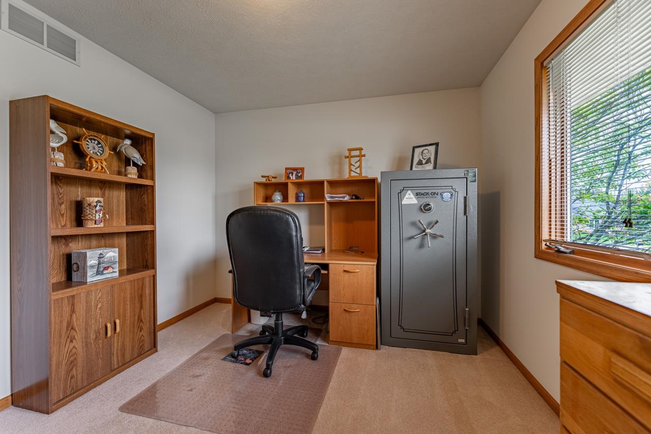 625 Waco Way Poplar Grove, IL 61065 - Photo 19 of 34 a view of a workspace with furniture and a window