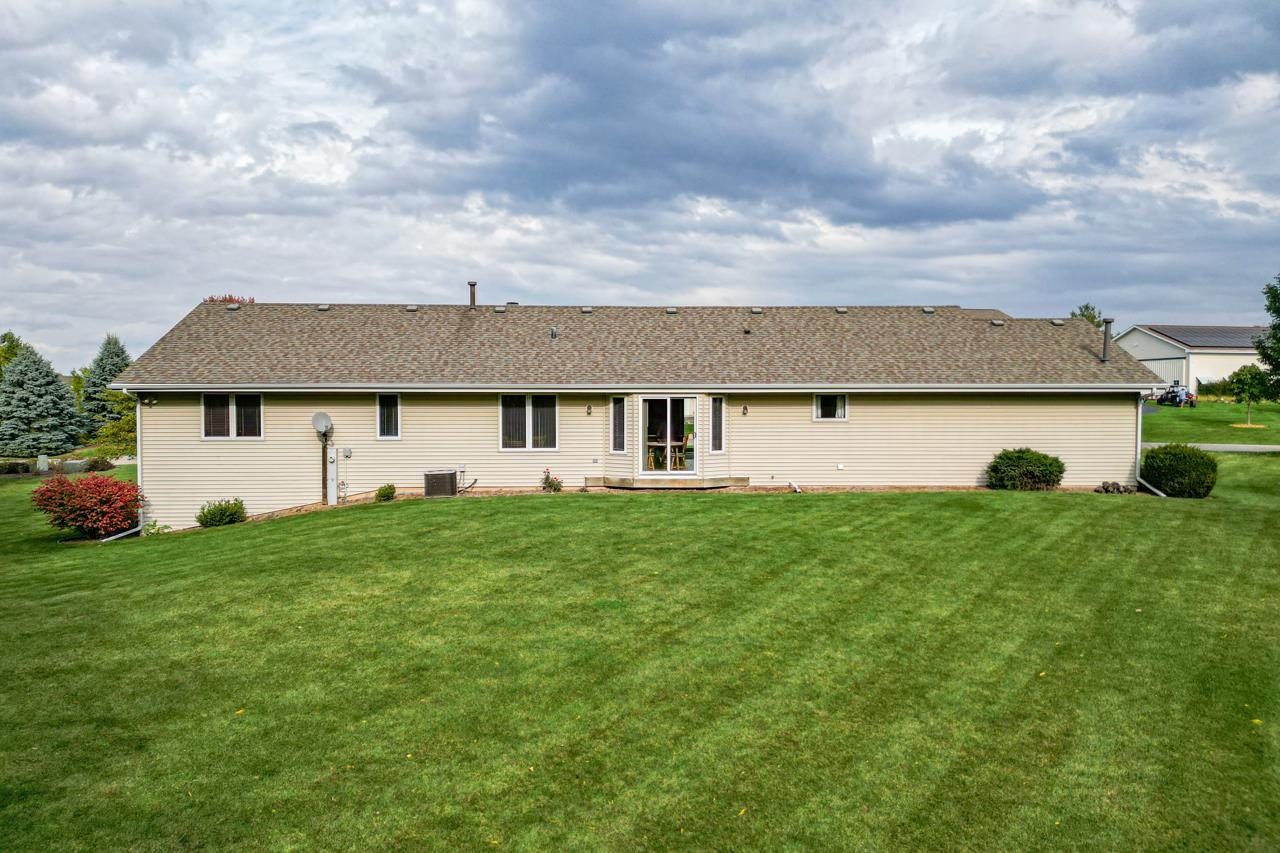 625 Waco Way Poplar Grove, IL 61065 - Photo 28 of 34 a view of a house with a backyard