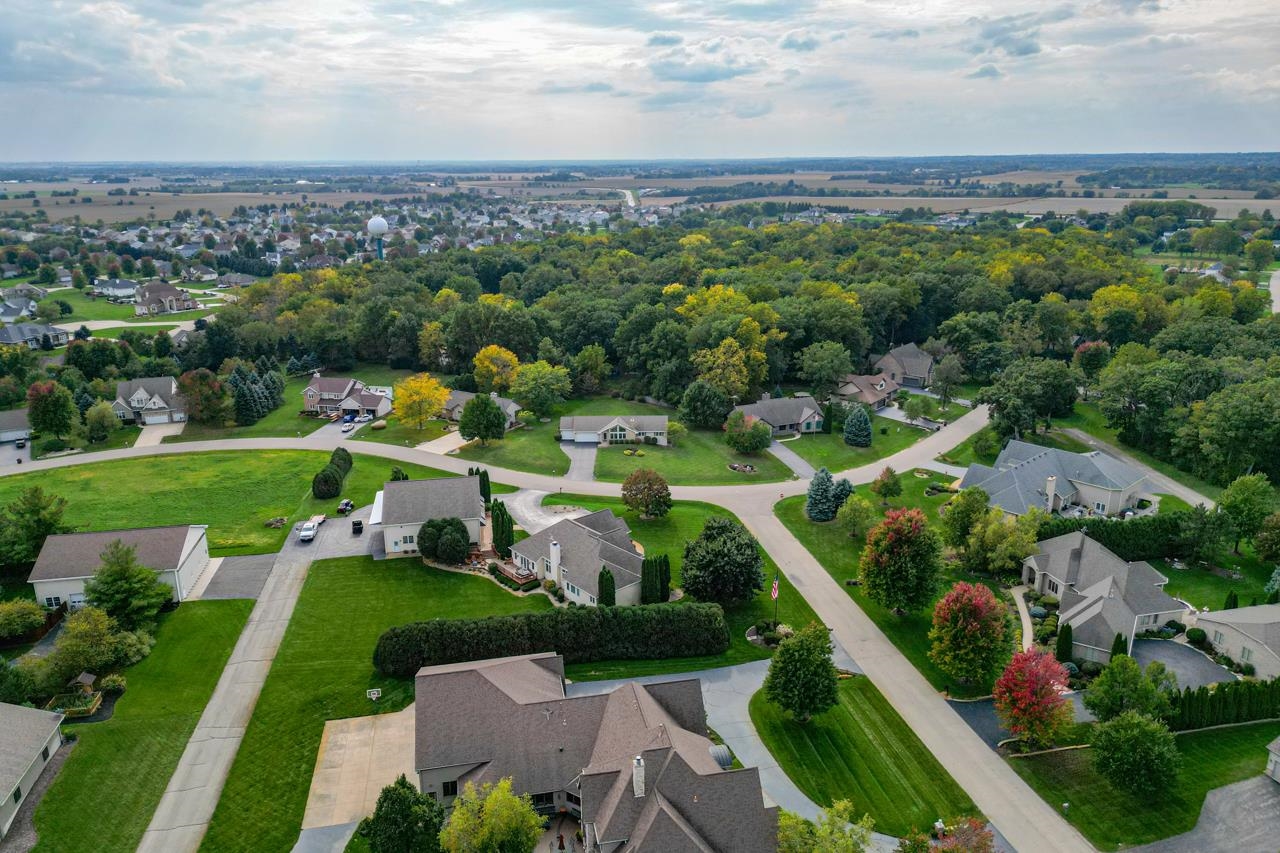 625 Waco Way Poplar Grove, IL 61065 - Photo 32 of 34 an aerial view of a city with lots of residential buildings