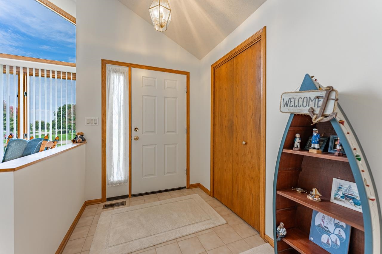 625 Waco Way Poplar Grove, IL 61065 - Photo 5 of 34 a view of room with walk in closet and window