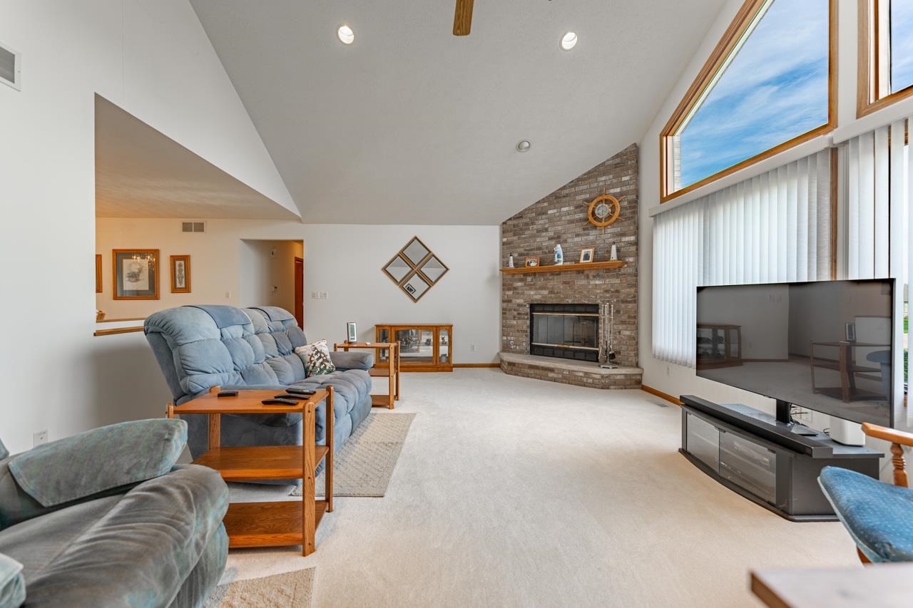 625 Waco Way Poplar Grove, IL 61065 - Photo 6 of 34 a living room with furniture and a flat screen tv