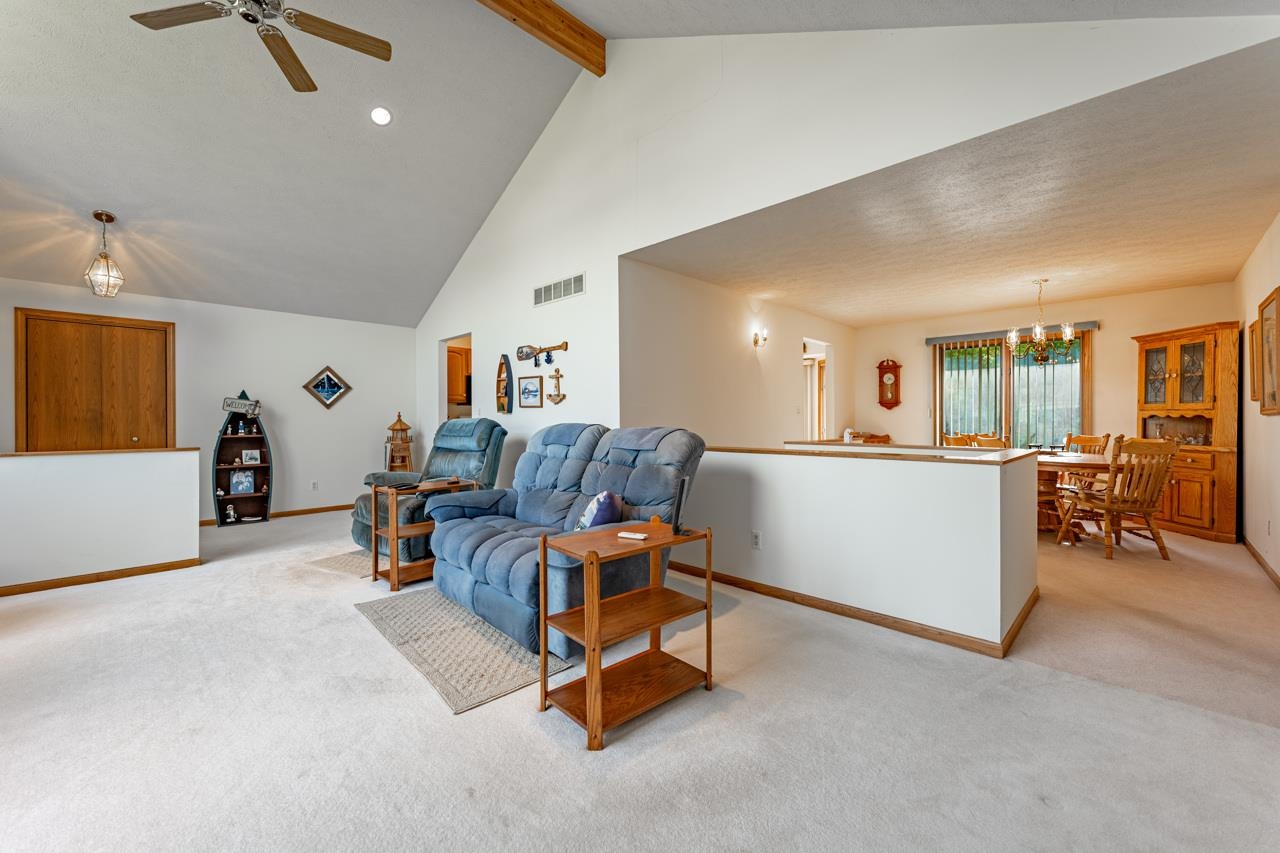 625 Waco Way Poplar Grove, IL 61065 - Photo 8 of 34 a living room with furniture and a table