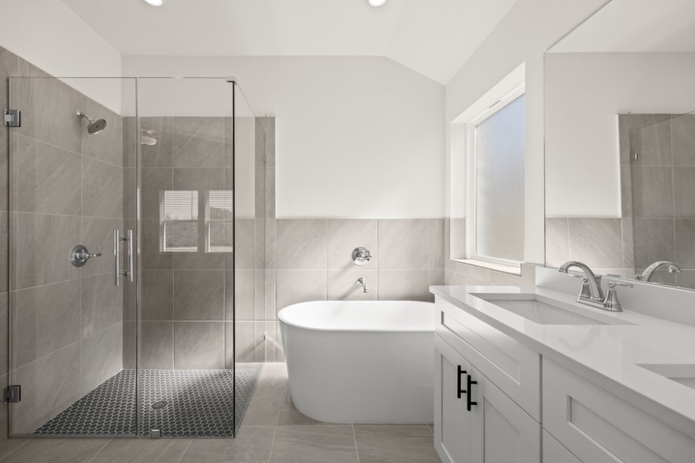 8311 Amber Summit Lane Angleton, TX 77515 - Photo 13 of 14 a bathroom with a double vanity sink mirror and shower