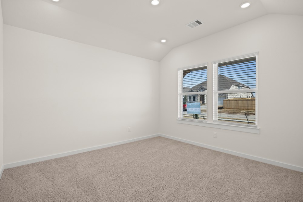 8311 Amber Summit Lane Angleton, TX 77515 - Photo 9 of 14 an empty room with a window