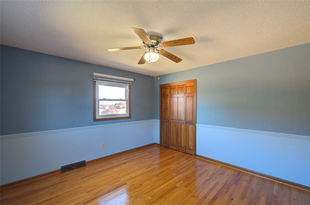 130 Raleighs Lane West Union, SC 29696 - Photo 23 of 49 Hardwood floors and a classic chair rail highlight this versatile space.