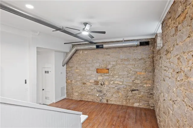a view of bathroom with a wooden floor