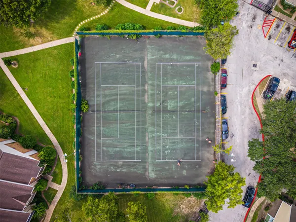an aerial view of a house with a garden