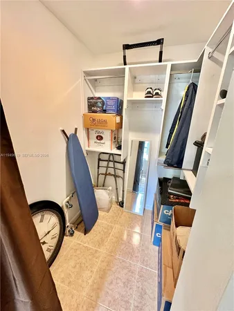 a view of a livingroom with furniture and front door