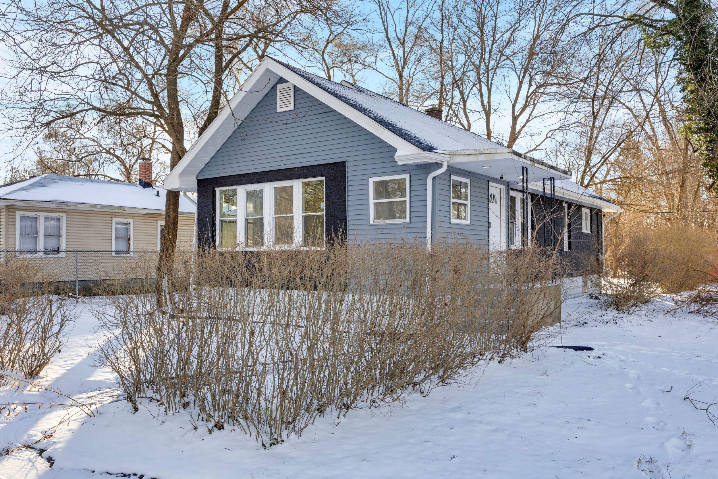 4200 Monroe Street Gary, IN 46408 - Photo 25 of 25 a front view of a house with a yard