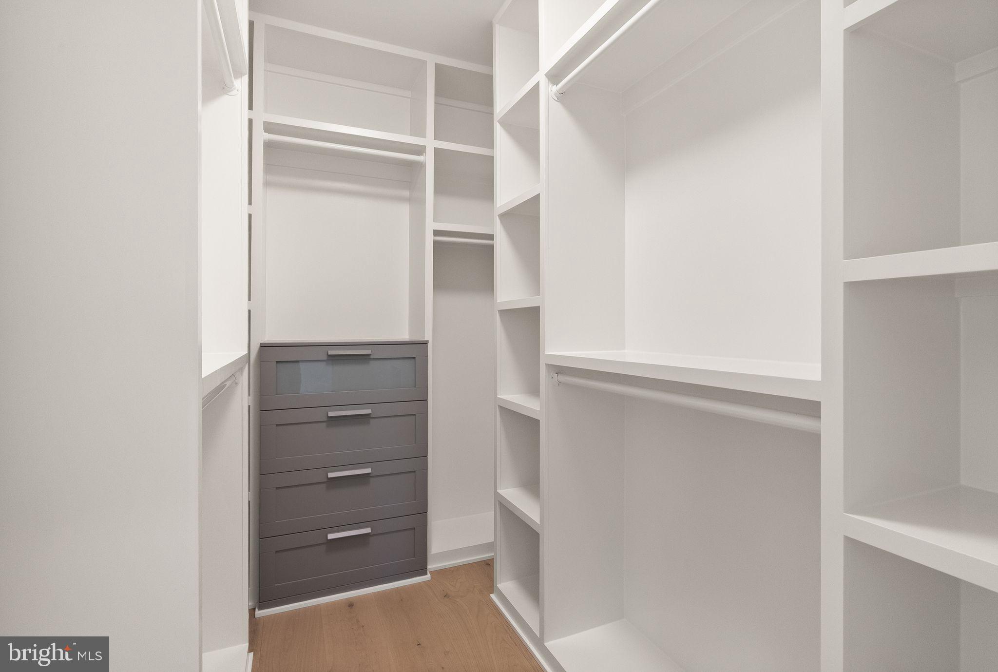 112 Elm Street Southwest Vienna, VA 22180 - Photo 43 of 96 a view of walk in closet with empty racks