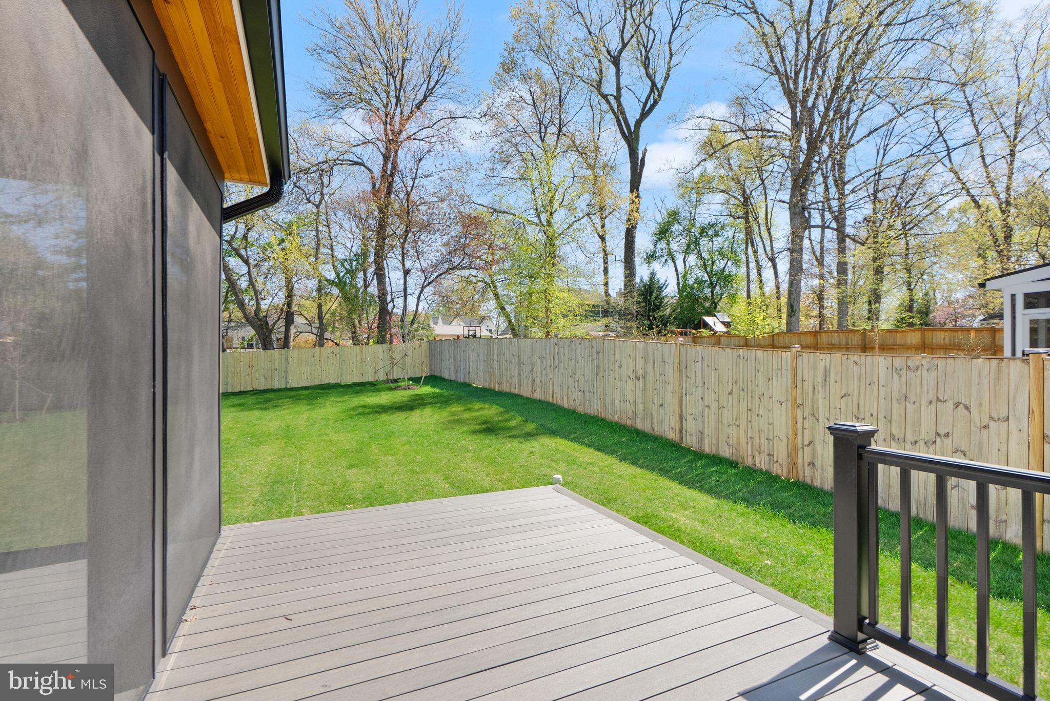 112 Elm Street Southwest Vienna, VA 22180 - Photo 86 of 96 a view of a backyard with wooden fence