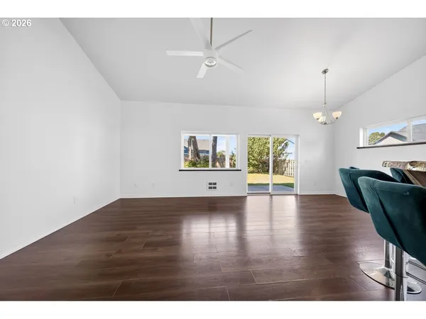 a view interior of a house wooden floor and fire place