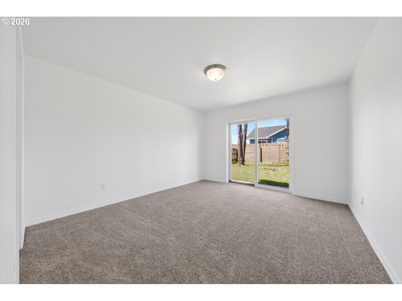 2679 Franklin Avenue Southwest Bandon, OR 97411 - Photo 20 of 48 a view of an empty room with a window