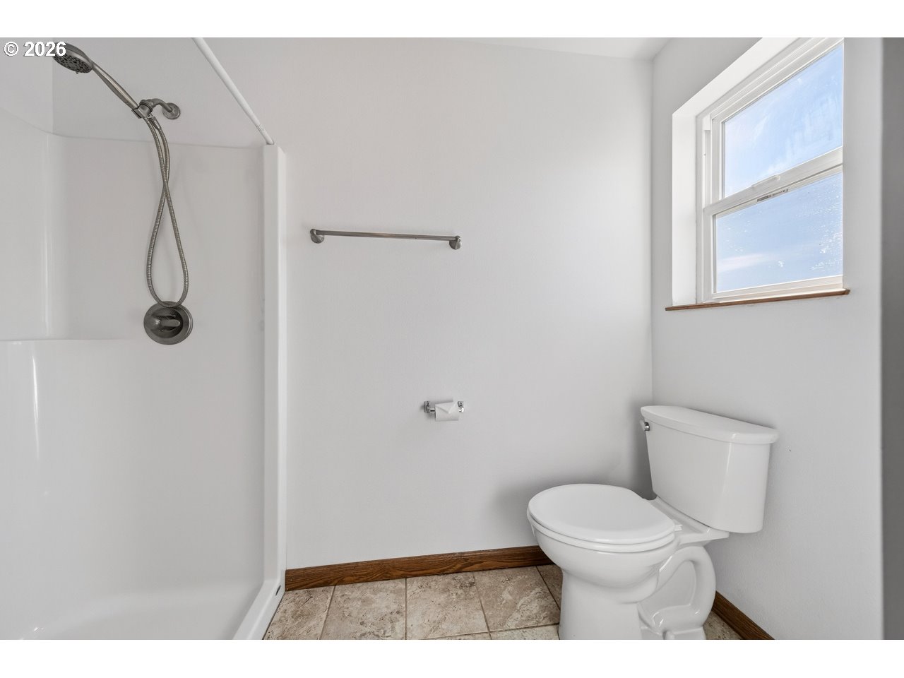 2679 Franklin Avenue Southwest Bandon, OR 97411 - Photo 23 of 48 a bathroom with a toilet and a shower