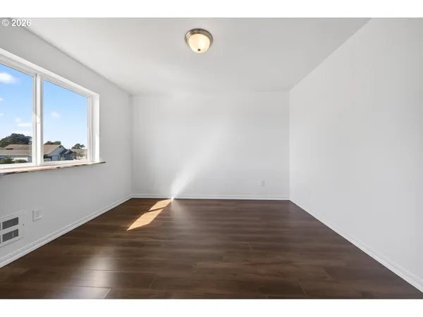 a picture of a glass door with a bench in front of it
