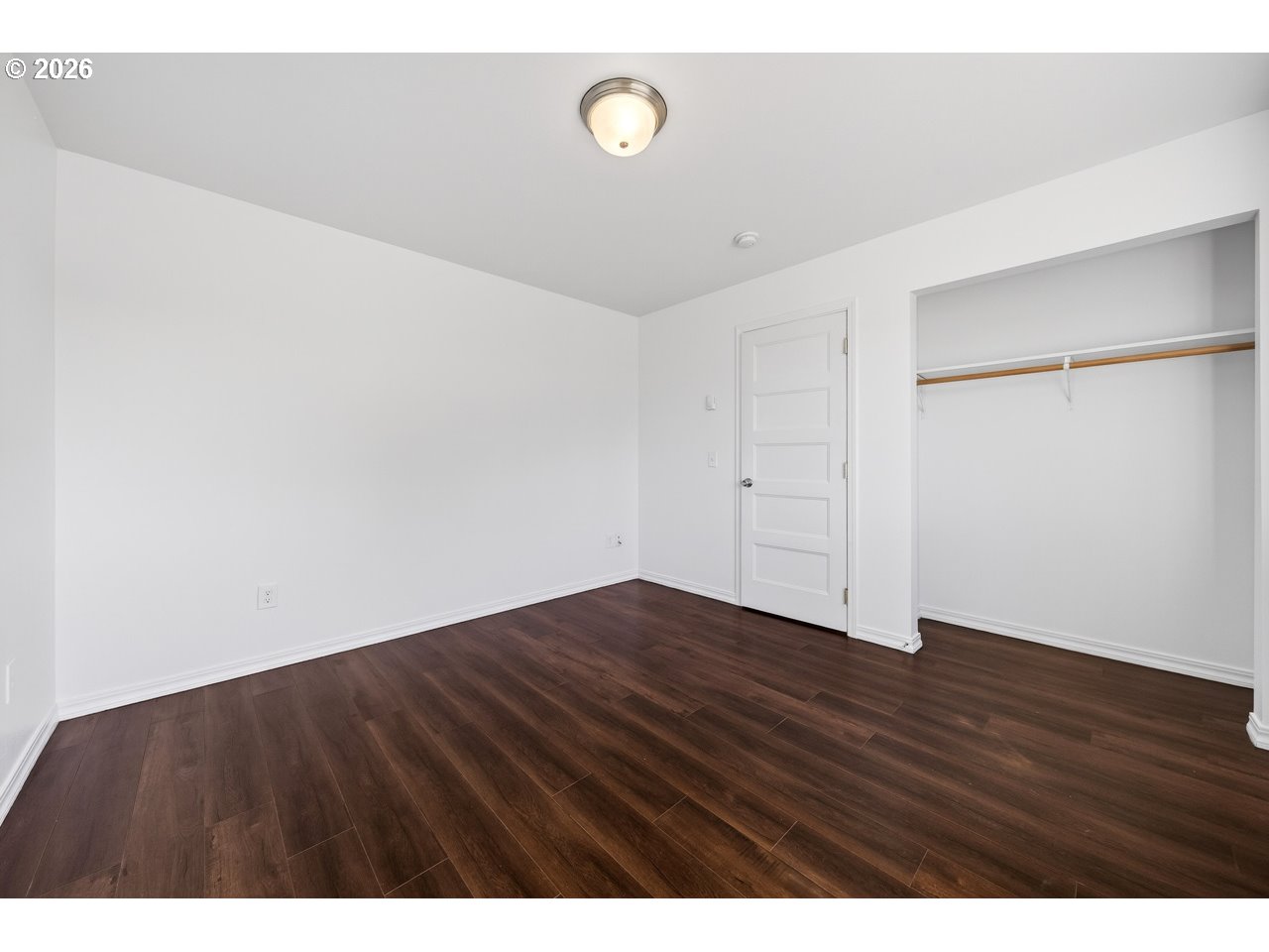 2679 Franklin Avenue Southwest Bandon, OR 97411 - Photo 31 of 48 a view of an empty room with wooden floor