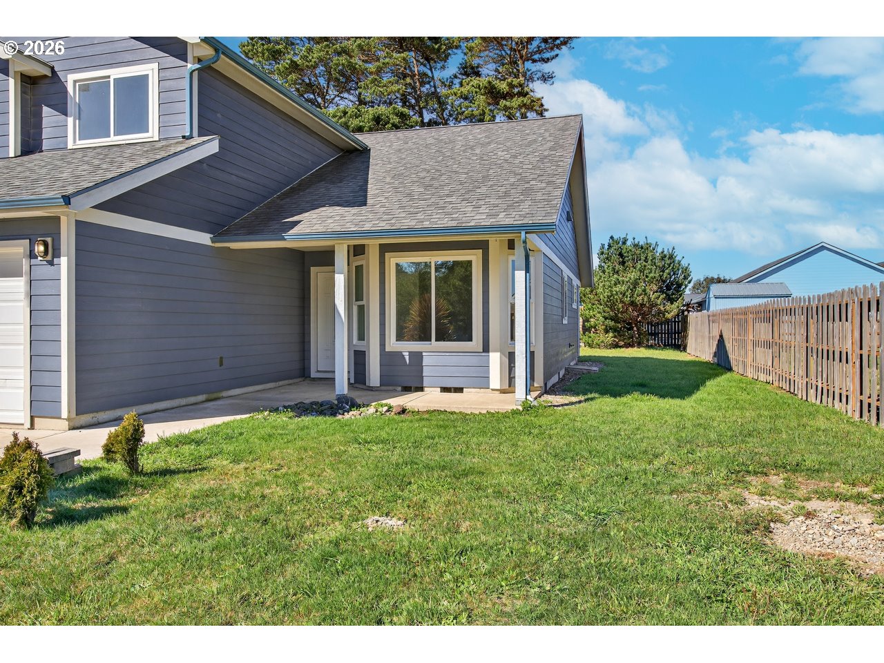 2679 Franklin Avenue Southwest Bandon, OR 97411 - Photo 44 of 48 a view of a house with backyard and garden