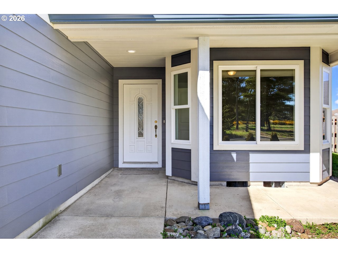 2679 Franklin Avenue Southwest Bandon, OR 97411 - Photo 6 of 48 a view of a house with a outdoor space