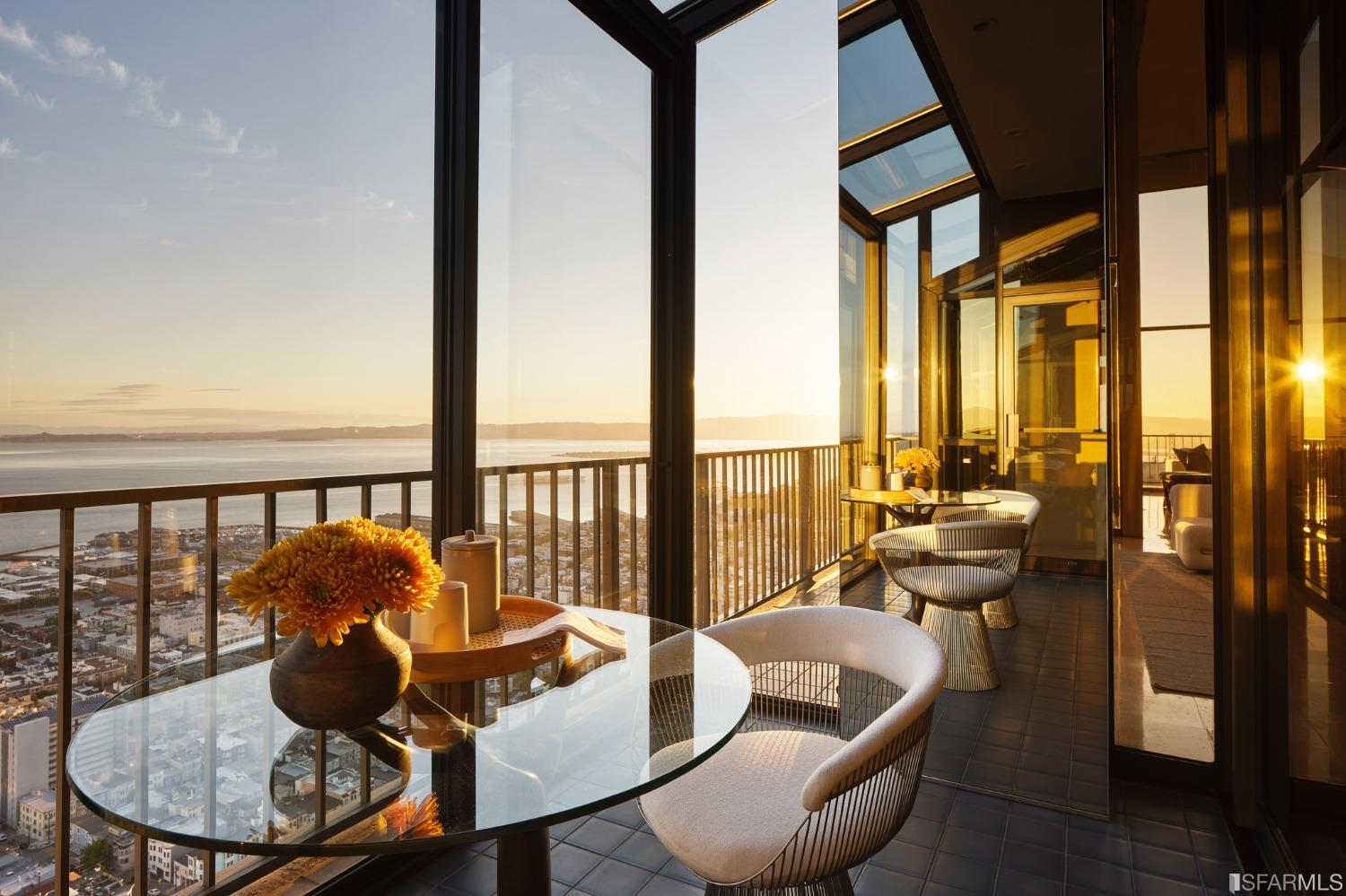 999 Green Street, Unit 3201 San Francisco, CA 94133 - Photo 12 of 28 a living room with furniture and a floor to ceiling window