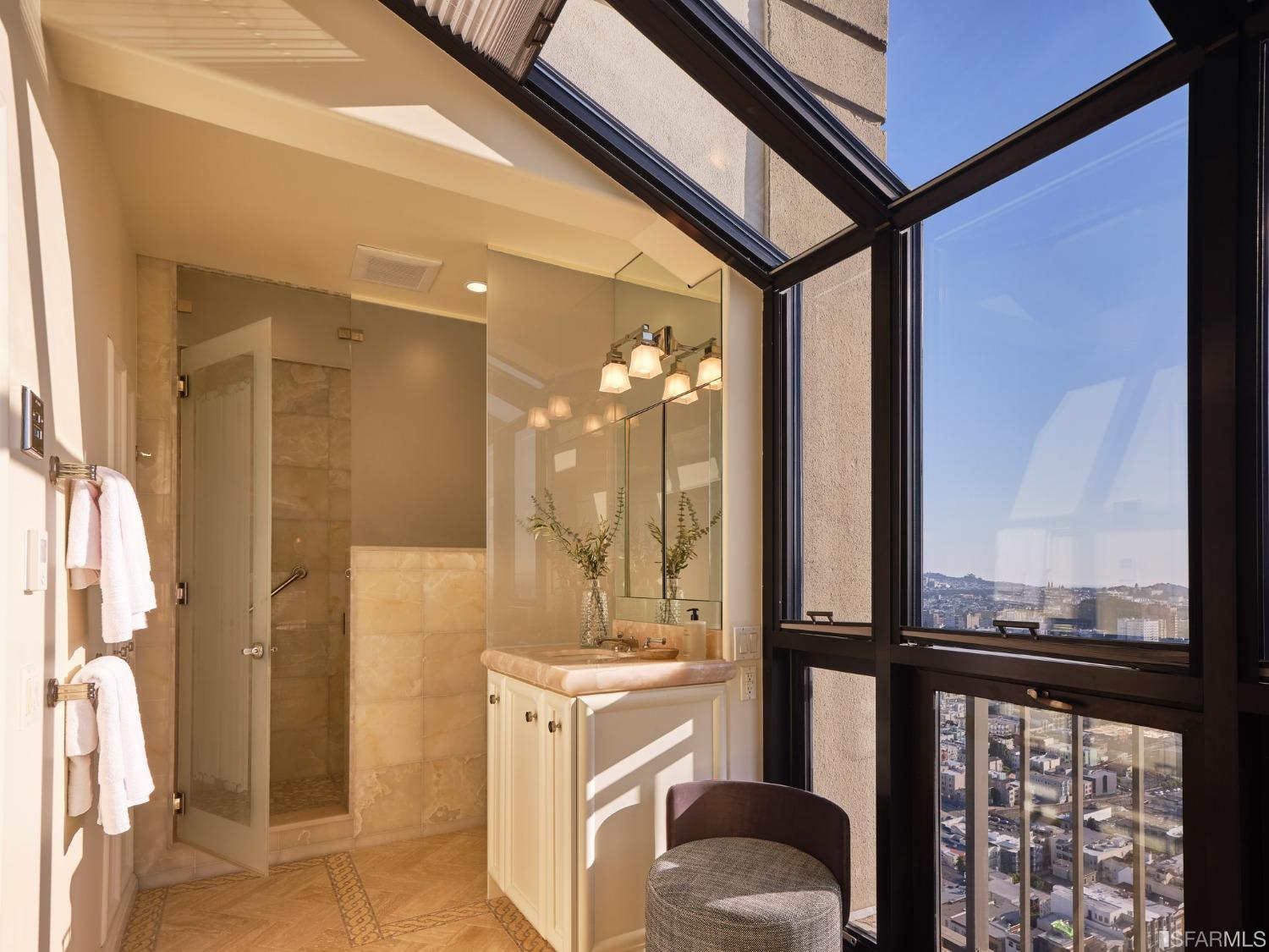 999 Green Street, Unit 3201 San Francisco, CA 94133 - Photo 15 of 28 a bathroom with a tub and shower