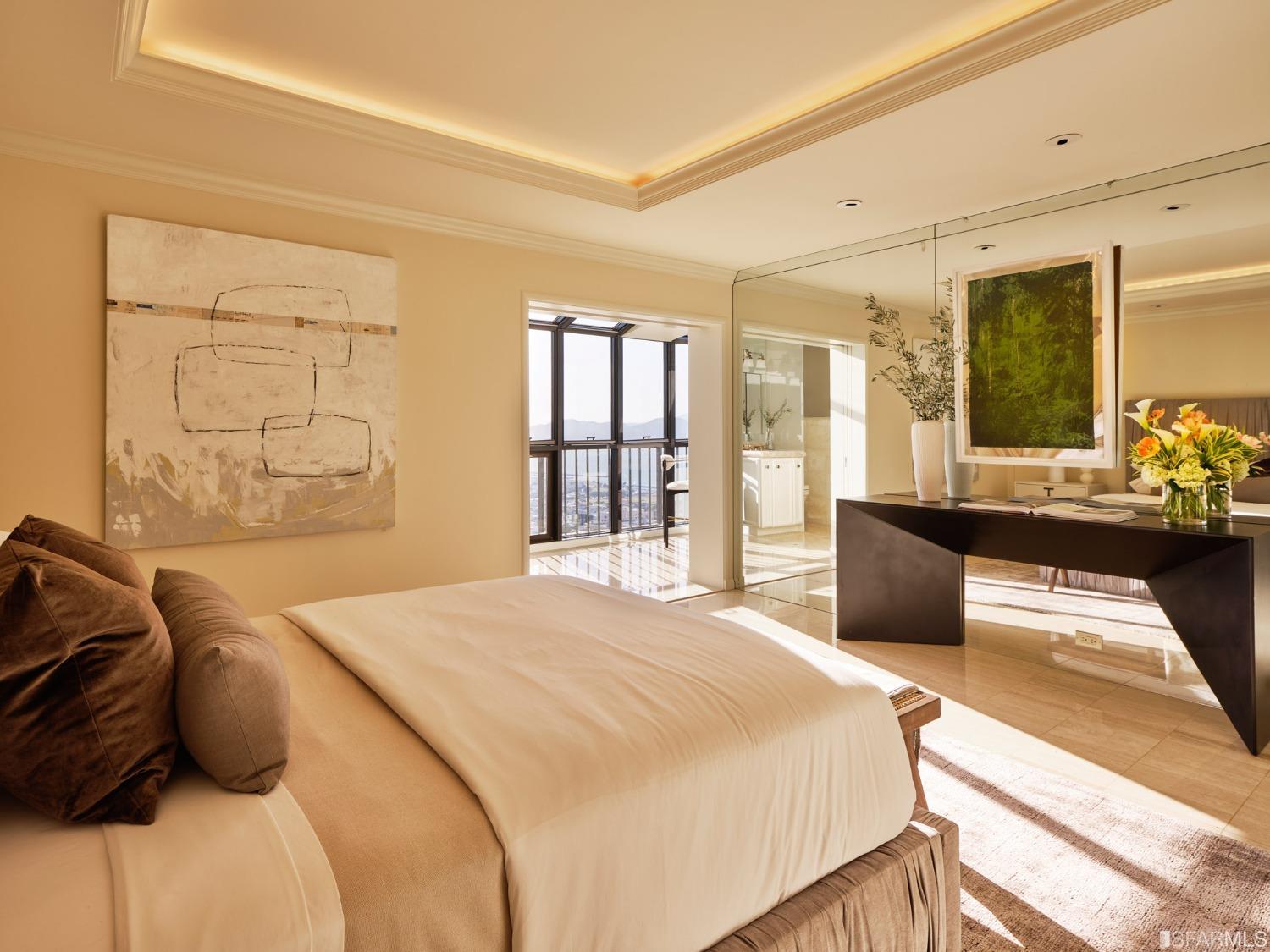 999 Green Street, Unit 3201 San Francisco, CA 94133 - Photo 16 of 28 a bedroom with a large bed and a large window