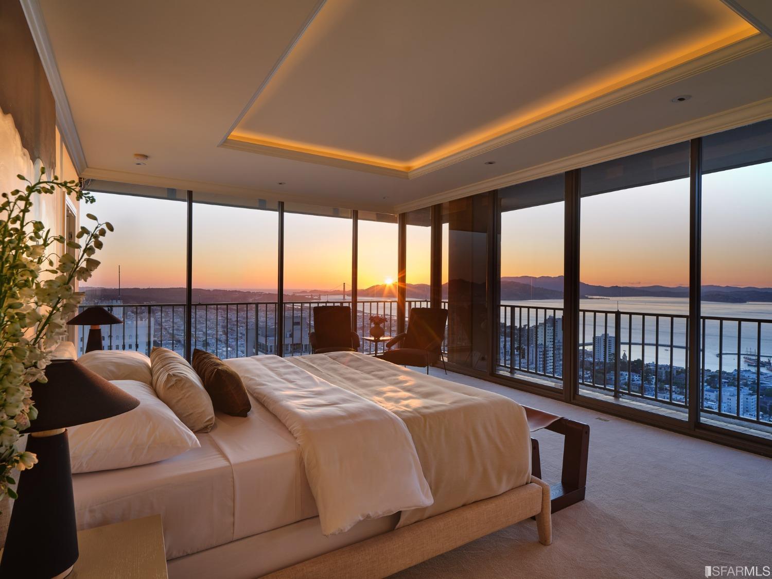 999 Green Street, Unit 3201 San Francisco, CA 94133 - Photo 20 of 28 a bedroom with a large bed and a large window