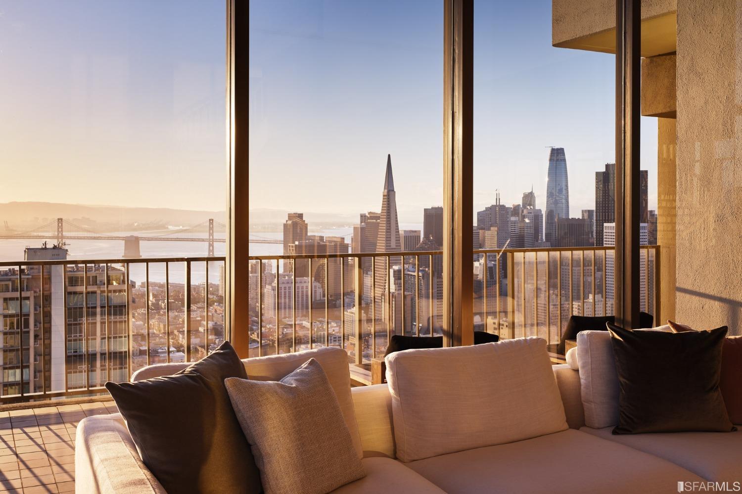 999 Green Street, Unit 3201 San Francisco, CA 94133 - Photo 23 of 28 a living room with furniture and a floor to ceiling window