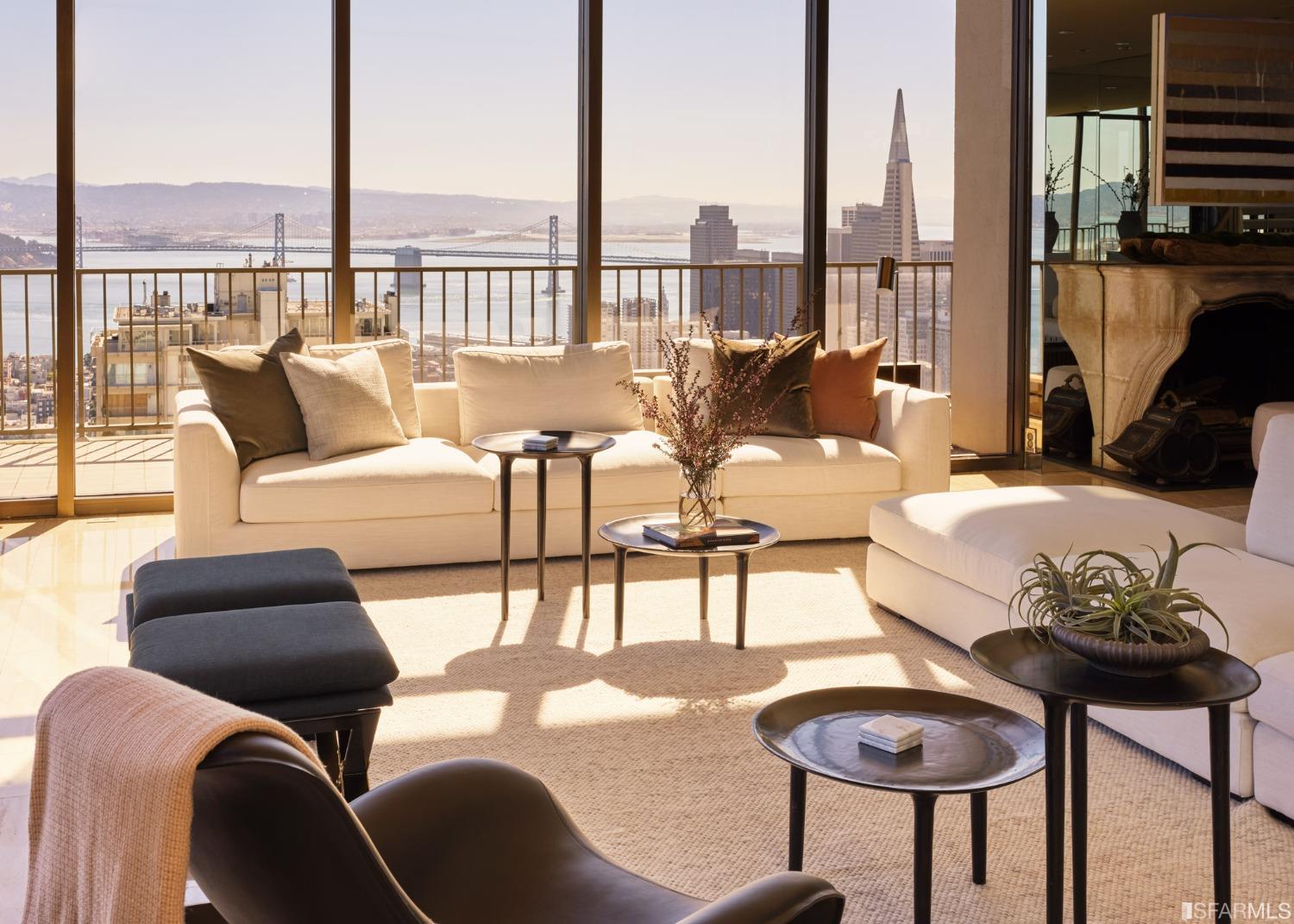 999 Green Street, Unit 3201 San Francisco, CA 94133 - Photo 6 of 28 a living room with furniture and a floor to ceiling window