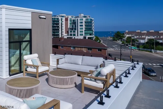 an aerial view of city and lake